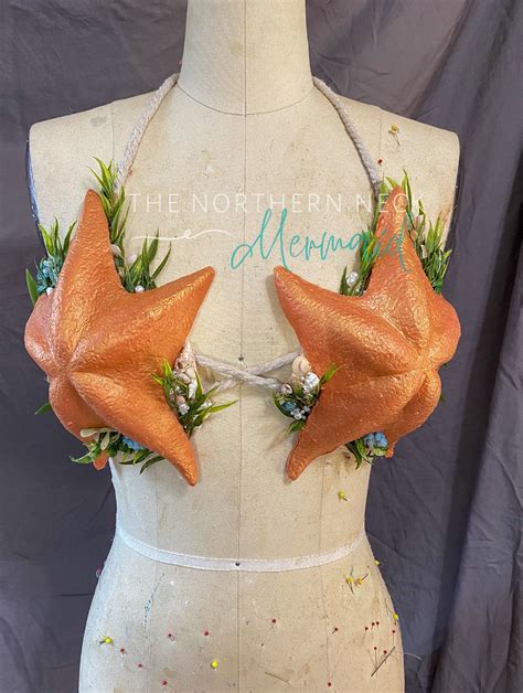 mermaid bra|mermaids with starfish bras.